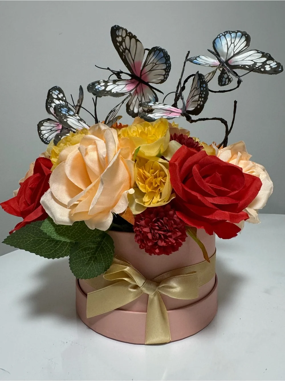 Elegant Pink Hatbox Floral Arrangement with Butterflies